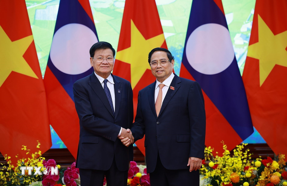 General Secretary and President of Laos Thongloun Sisoulith expressed his pleasure at attending the signing ceremony of the Hanoi Convention. Photo: VNA