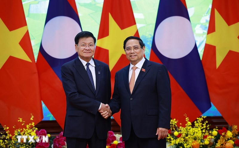 General Secretary and President of Laos Thongloun Sisoulith expressed his pleasure at attending the signing ceremony of the Hanoi Convention. Photo: VNA