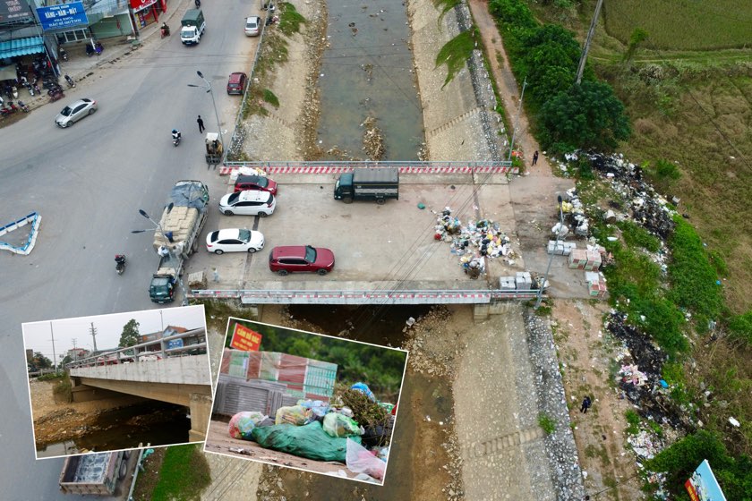 The billion-dollar bridge in Thai Nguyen has become a landfill due to lack of connecting roads. Photo: PV Group.
