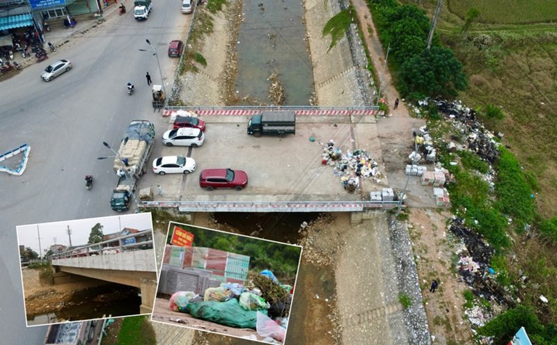 The billion-dollar bridge in Thai Nguyen has become a landfill due to lack of connecting roads. Photo: PV Group.