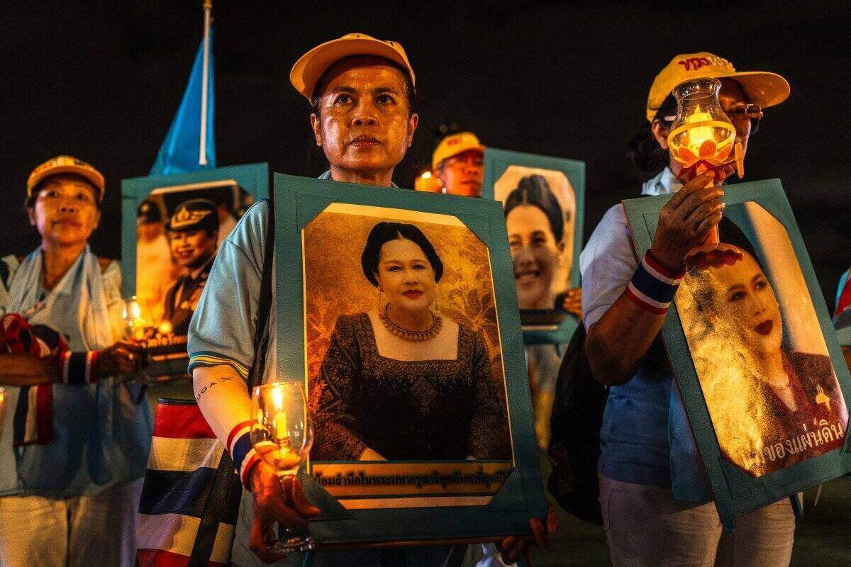 Supporters hold a portrait of Miss Sirikit at her 93rd birthday celebration in Bangkok, Thailand, on August 12, 2025. Photo: AFP
