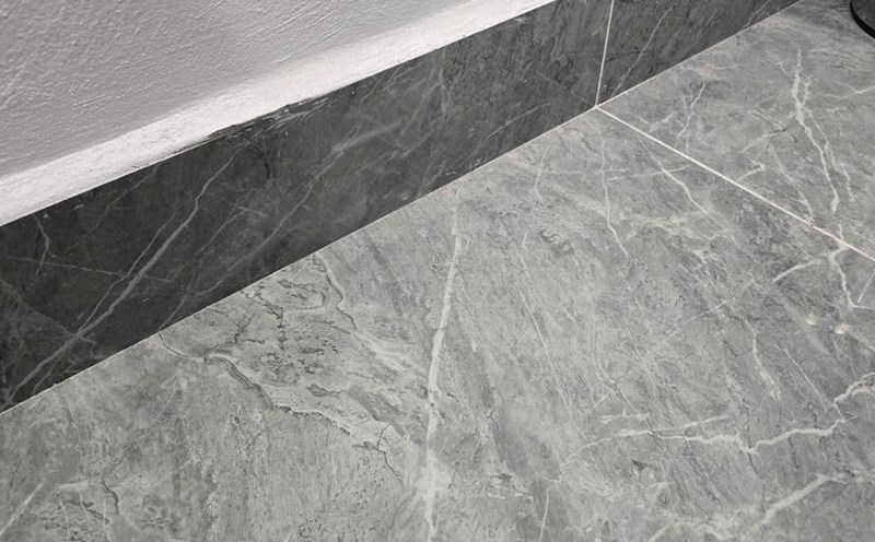 Neutral colored tiles bring sophistication, relaxation and create a spacious feeling for the living space. Photo: Tuan Dat