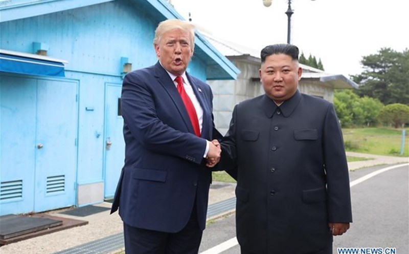 President Donald Trump and North Korean leader Kim Jong Un at the border village of Ban Mon Diem on June 30, 2019. Photo: Xinhua