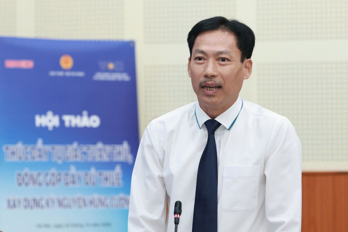 Associate Professor, Dr. Le Xuan Truong answered the press within the framework of the Workshop "Promoting self- compliance and full tax contributions - Building a strong era". Photo: Hai Nguyen