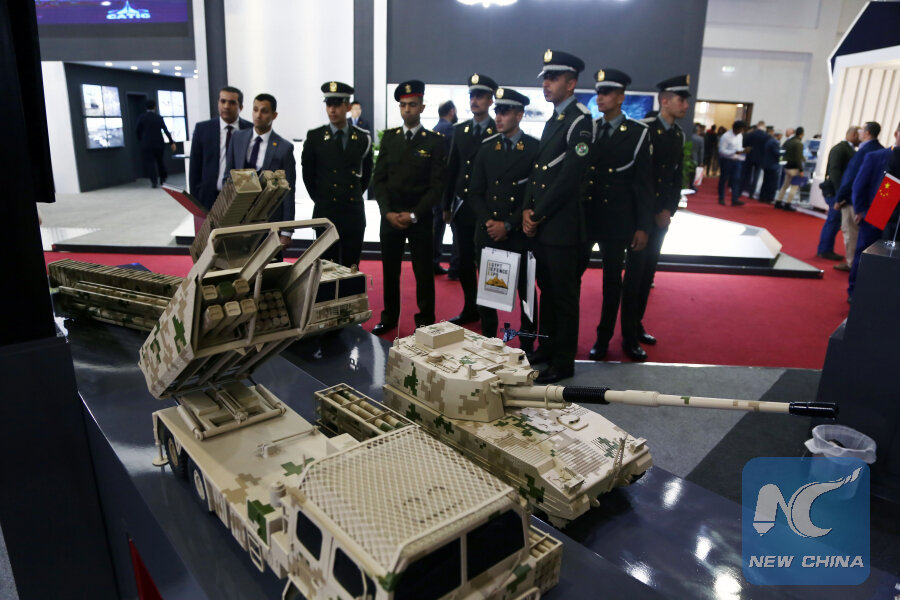 Visitors to the exhibition booth of Chinese defense industry company NORINCO on December 4, 2018. Photo: Xinhua