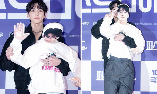 Jungkook mang búp bê hình Cha Eun Woo đến buổi ra mắt phim. Ảnh: cắt từ video