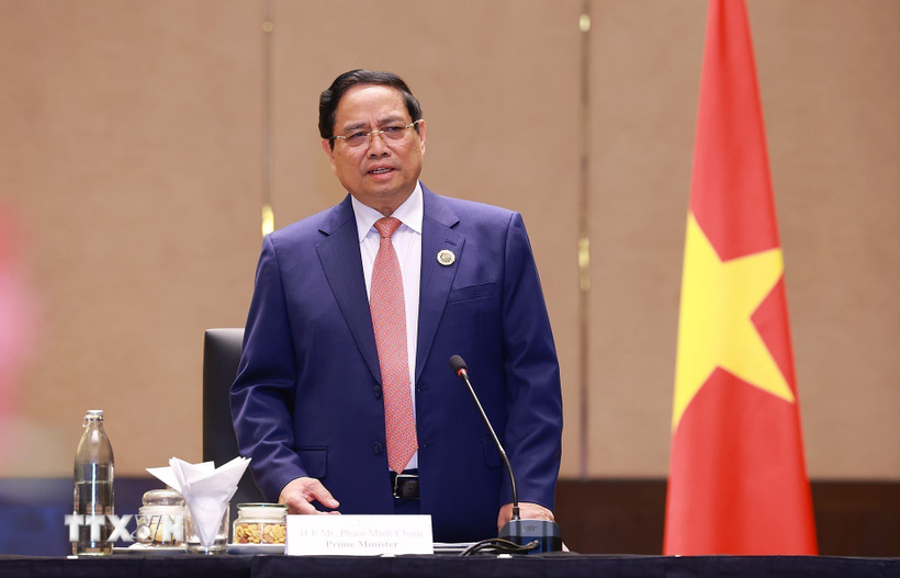 Politburo member and Prime Minister Pham Minh Chinh at a meeting on October 28. Photo: VNA