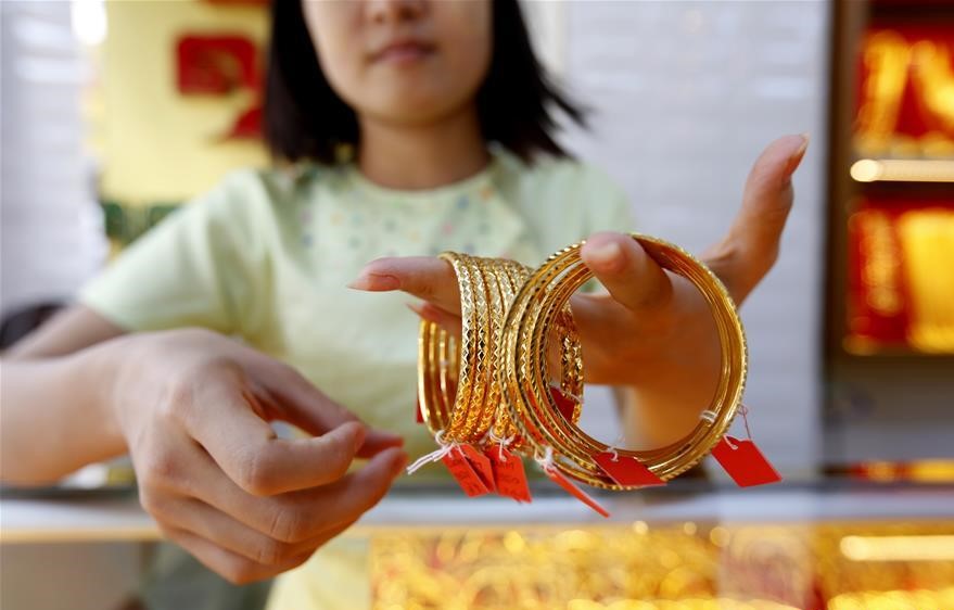 Gold prices are forecast to reach $5,000/ounce in 2026. Photo: Xinhua