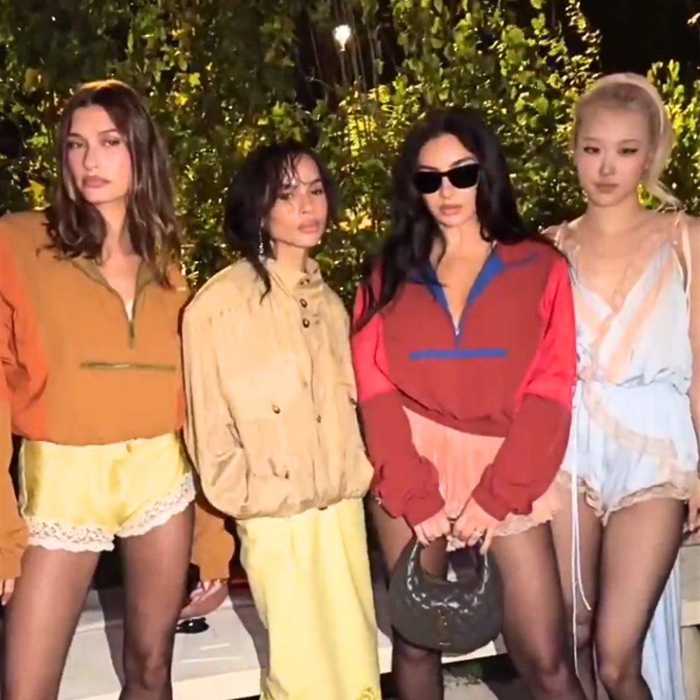 Hailey Bieber, Zoë Kravitz, Charli XCX, Rose (from left) took a group photo at Saint Laurent's show. Photo: cut from video