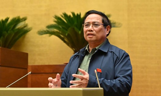 Ủy viên Bộ Chính trị, Thủ tướng Chính phủ Phạm Minh Chính cho biết chúng ta sẽ xem xét tăng lương sớm hơn. Ảnh: Phạm Đông