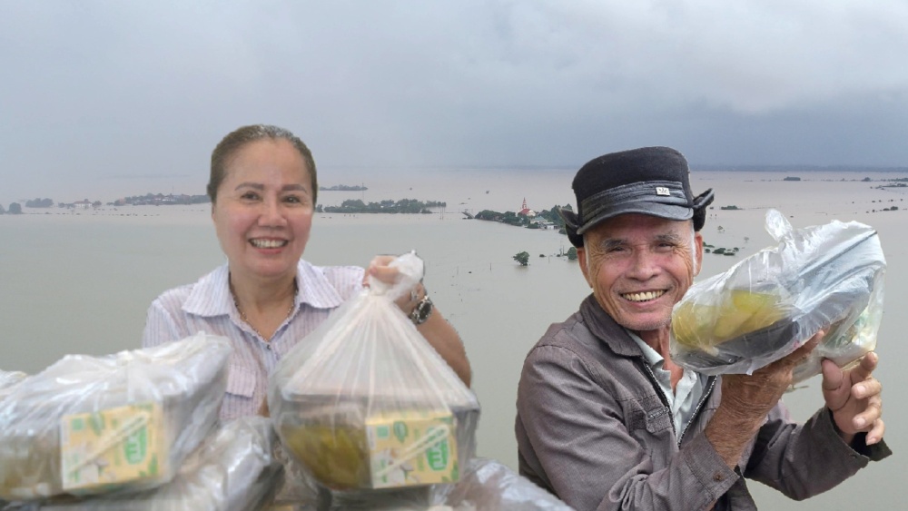 홍수 지역의 부엌은 불이 꺼지고 자선 부엌은 불을 피워 밥을 지어 주민들에게 매 끼니마다 보급합니다. 사진: 흥터