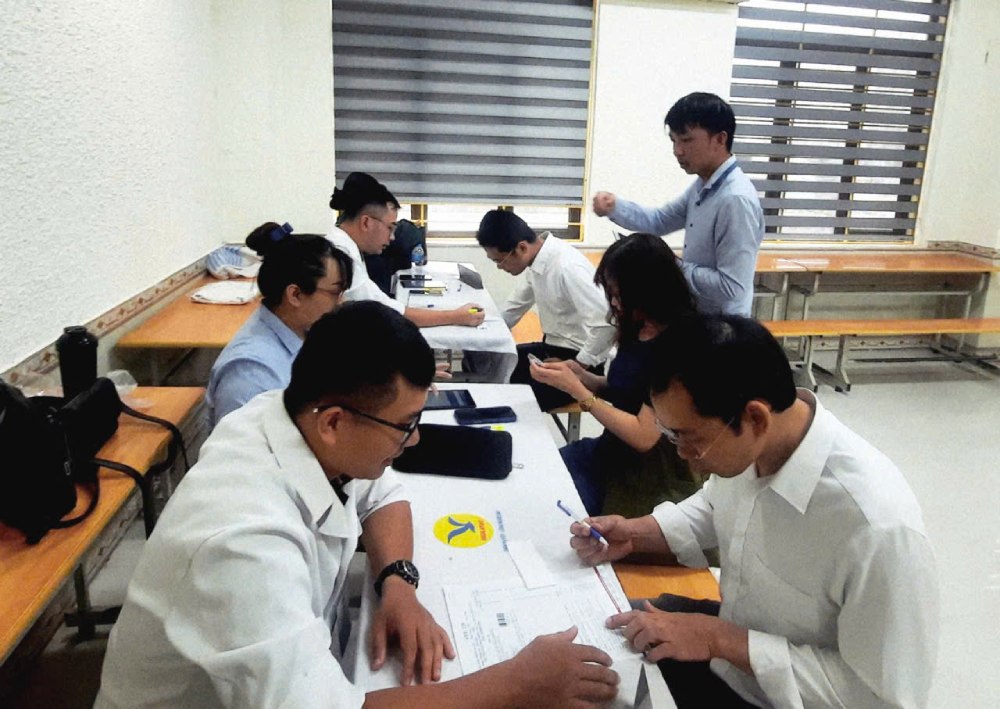 Forme et contenu du recrutement de fonctionnaires sur la base de l'article 11 du decret 170. Photo : Quynh Chi