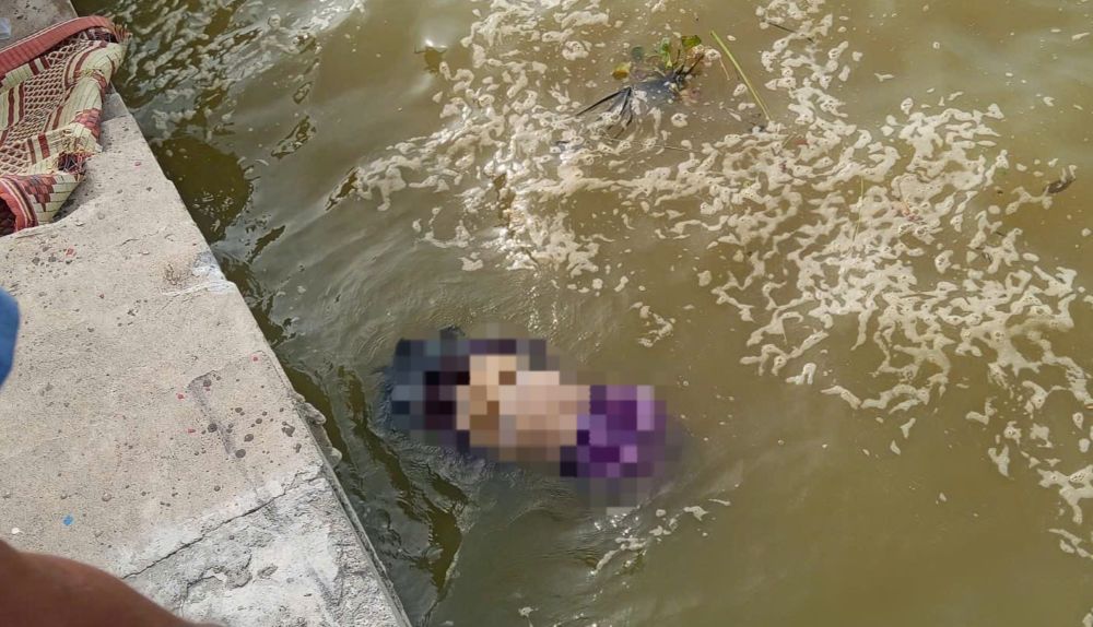 The woman's body was discovered in the Thuan An fishing port area. Photo: Q.An