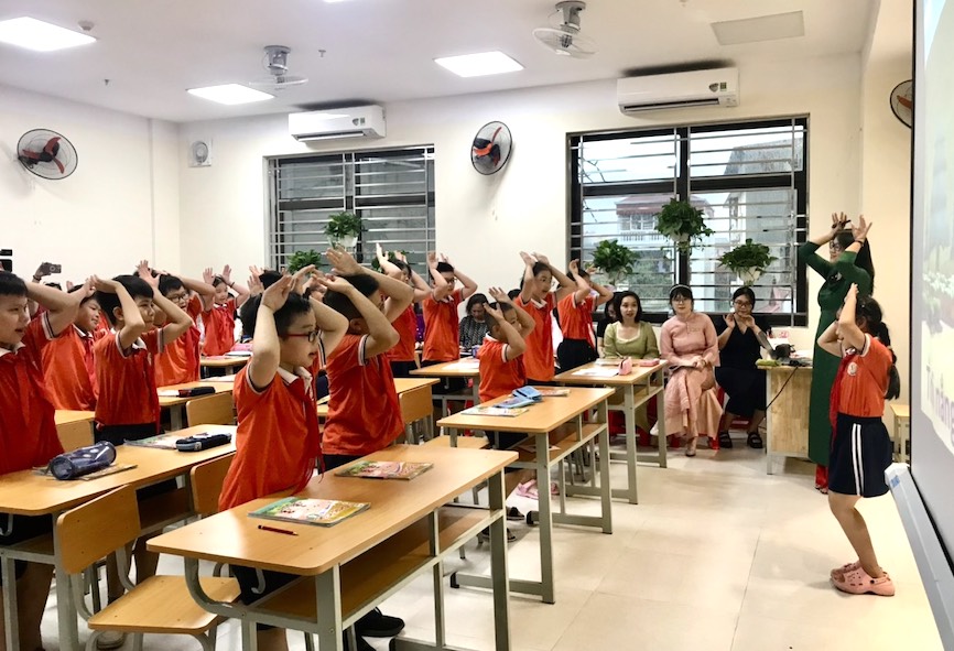 Bo Giao duc va Dao tao (GDDT) yeu cau chi sap nhap truong, diem truong trong pham vi mot xa, phuong; khong sap nhap truong mam non voi pho thong. Anh: Van Trang   