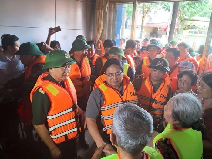 Thu tuong Pham Minh Chinh truc tiep thi sat vung ngap lut Thai Nguyen. Anh: Cong thong tin dien tu tinh Thai Nguyen.