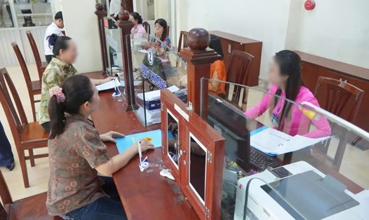 Trước ngày 10.10, phải hoàn thành dứt điểm việc chi trả chế độ cho tất cả các trường hợp đã có quyết định nghỉ việc trước ngày 31.8. Ảnh: Tạ Quang