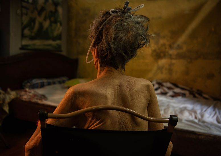 My Mother After the Storm - Second Prize Head On Photo Awards. Photo: Viet Van