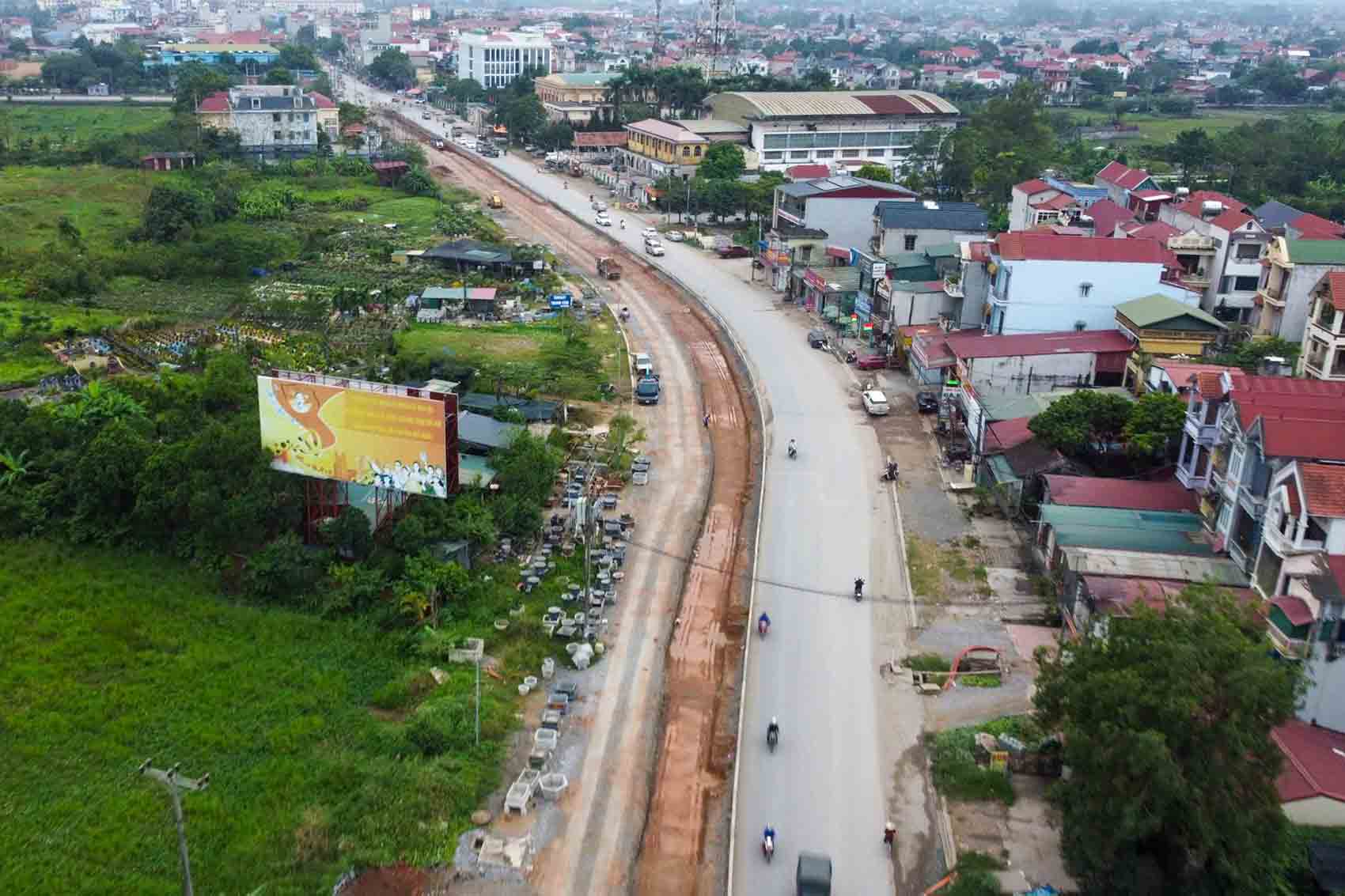 Du an mo rong Quoc lo 32 giai doan 1 doan qua xa Quang Oai, Ha Noi. Anh: Song Huu 