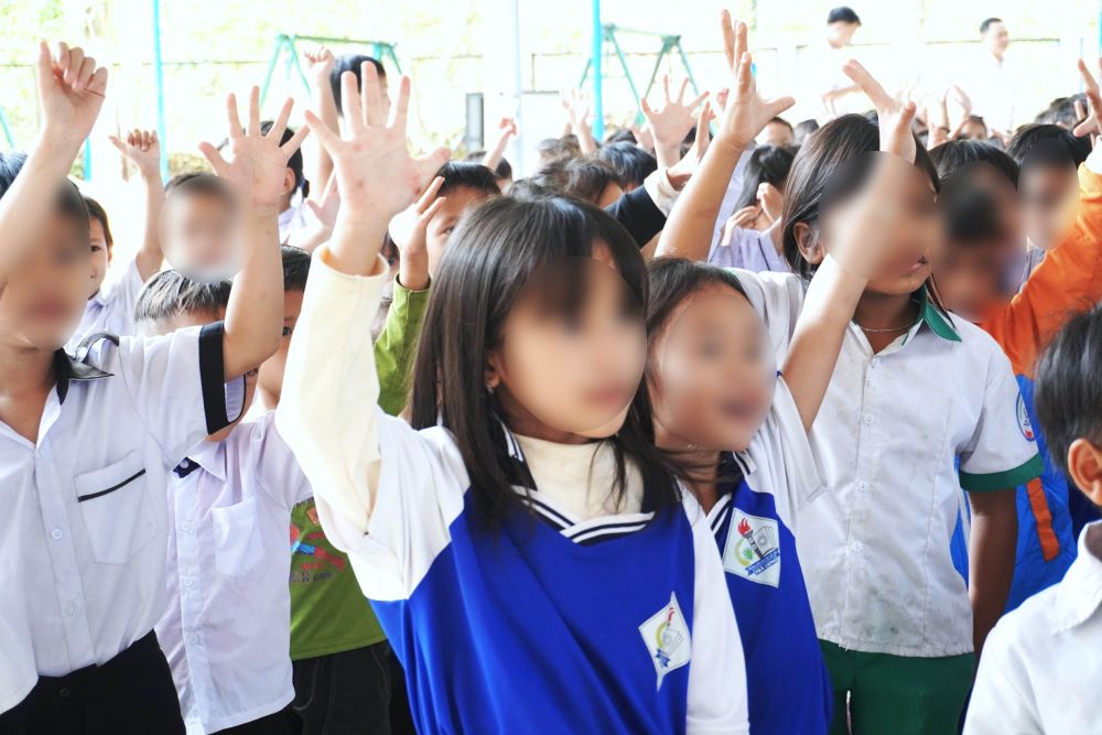 Nu cuoi hon nhien cua cac em hoc sinh. Anh: Tran Thi