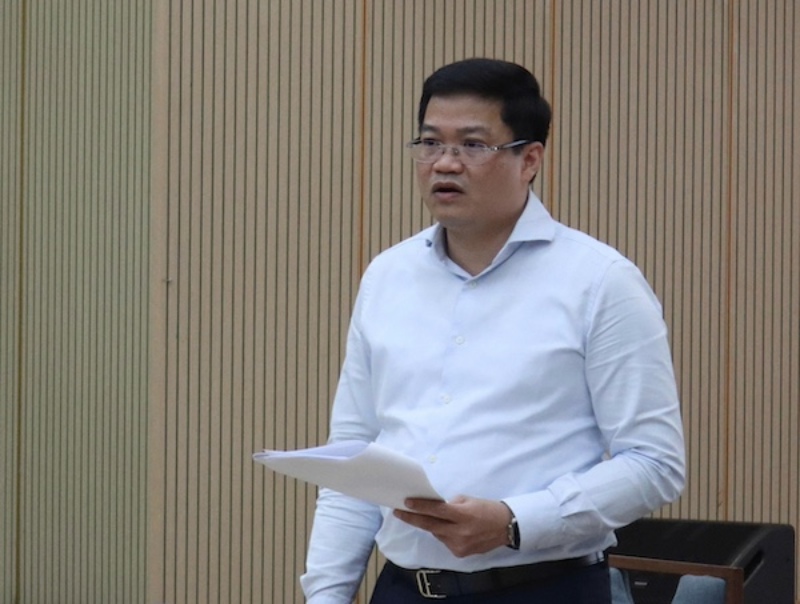 Thu truong Bo Tai chinh Nguyen Duc Tam bao cao tai cuoc hop. Anh: Hong May