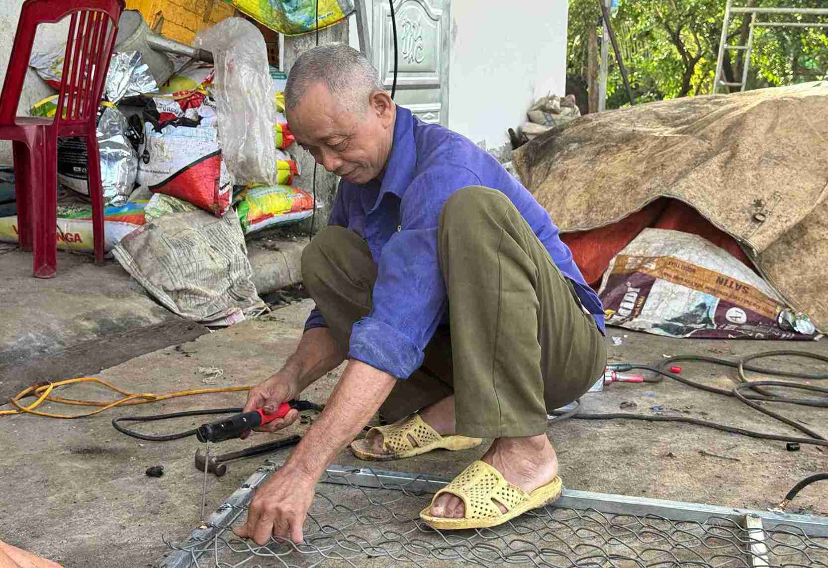 Nguoi uy tin o xa Ea Wer tro thanh kenh thong tin quan trong de chinh quyen nam bat tam tu, tinh cam cua nguoi dan dia phuong. Anh: Bao Lam
