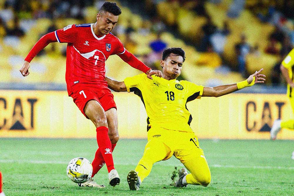 Malaysia (yellow shirt) beat Nepal 1-0 in the final qualifying round of the 2027 Asian Cup. Photo: FAM