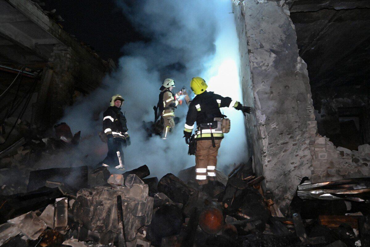 Rescue workers in Kharkiv after a Russian airstrike. Photo: AFP