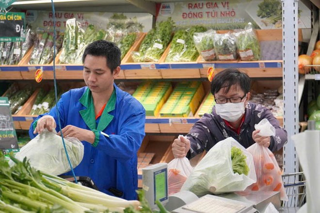 TPHCM day manh kich cau, on dinh thi truong. Anh: Ha May 