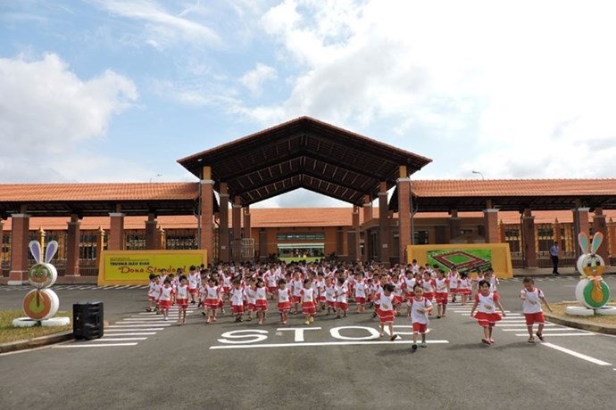 Con cong nhan tai truong mau giao Dona Standard o Khu cong nghiep Xuan Loc, xa Xuan Hoa, tinh Dong Nai. Anh tu lieu: HAC