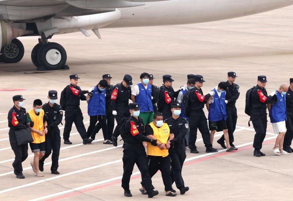 Suspects involved in online gambling and fraud were escorted by Chinese police at Tianja, Wukong, and Hubei airports on April 13, 2024. Photo: Xinhua