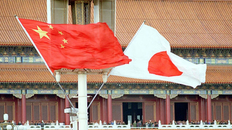 La bandera china y la bandera japonesa. Foto: Xinhua