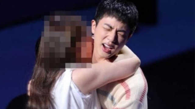 BTS's Jin was forced to kiss. Photo cut from video