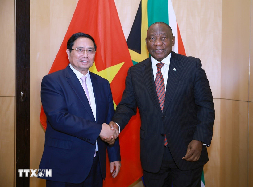 Politburo member, Prime Minister Pham Minh Chinh and South African President Cyril Ramaphosa. Photo: VNA