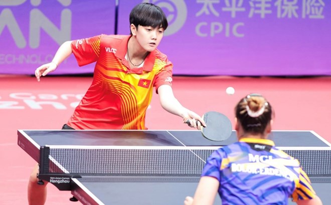 Tran Mai Ngoc la duong kim vo dich SEA Games 33 noi dung doi nam nu. Anh: Bui Luong
