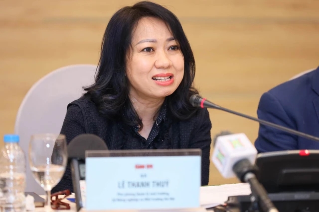 ba Le Thanh Thuy - Pho truong phong Quan ly Moi truong (So Nong nghiep va Moi truong Thanh pho Ha Noi) noi ve viec cam xe may, chuyen doi xanh trong Vanh dai 1. Anh: Quang The