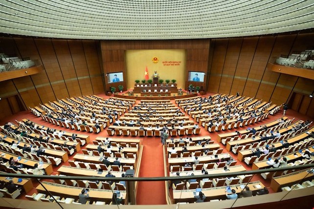 Sang 25.11, Bo truong Giao duc va Dao tao Nguyen Kim Son trinh Quoc hoi to trinh Quyet dinh chu truong dau tu Chuong trinh muc tieu quoc gia hien dai hoa, nang cao chat luong giao duc va dao tao giai doan 2026-2035. Anh: Media Quoc hoi