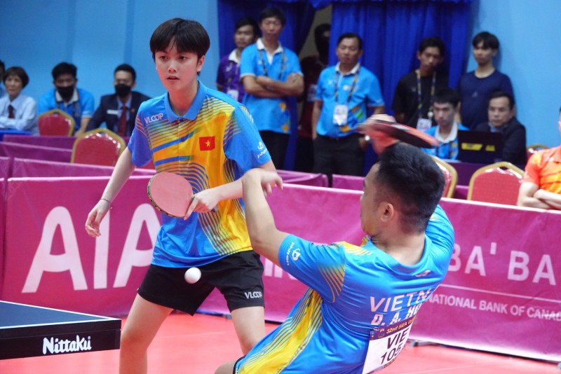 Mai Ngoc va Anh Hoang gianh huy chuong vang lich su cho bong ban Viet Nam tai SEA Games 32. Anh: Nguyen Dang