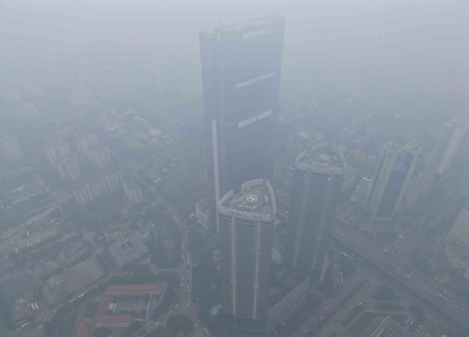 北部省が重度の大気汚染に見舞われる時期の予測。写真:Huu Chanh