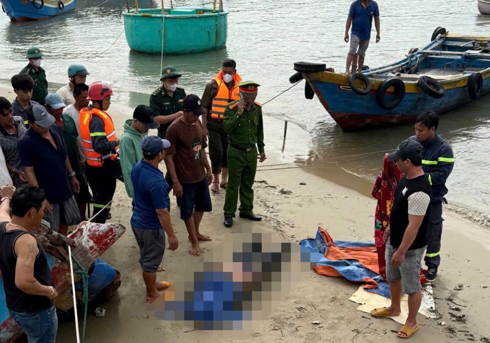 Thi the ngu dan mat tich do lat thung da duoc tim thay. Anh: Pham Duy 