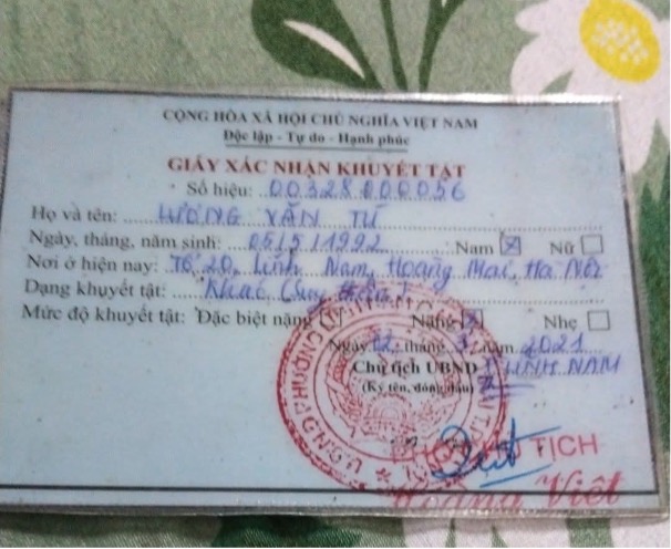 Giay xac nhan khuyet tat cua anh Luong Van Tu. Anh: Nhan vat cung cap