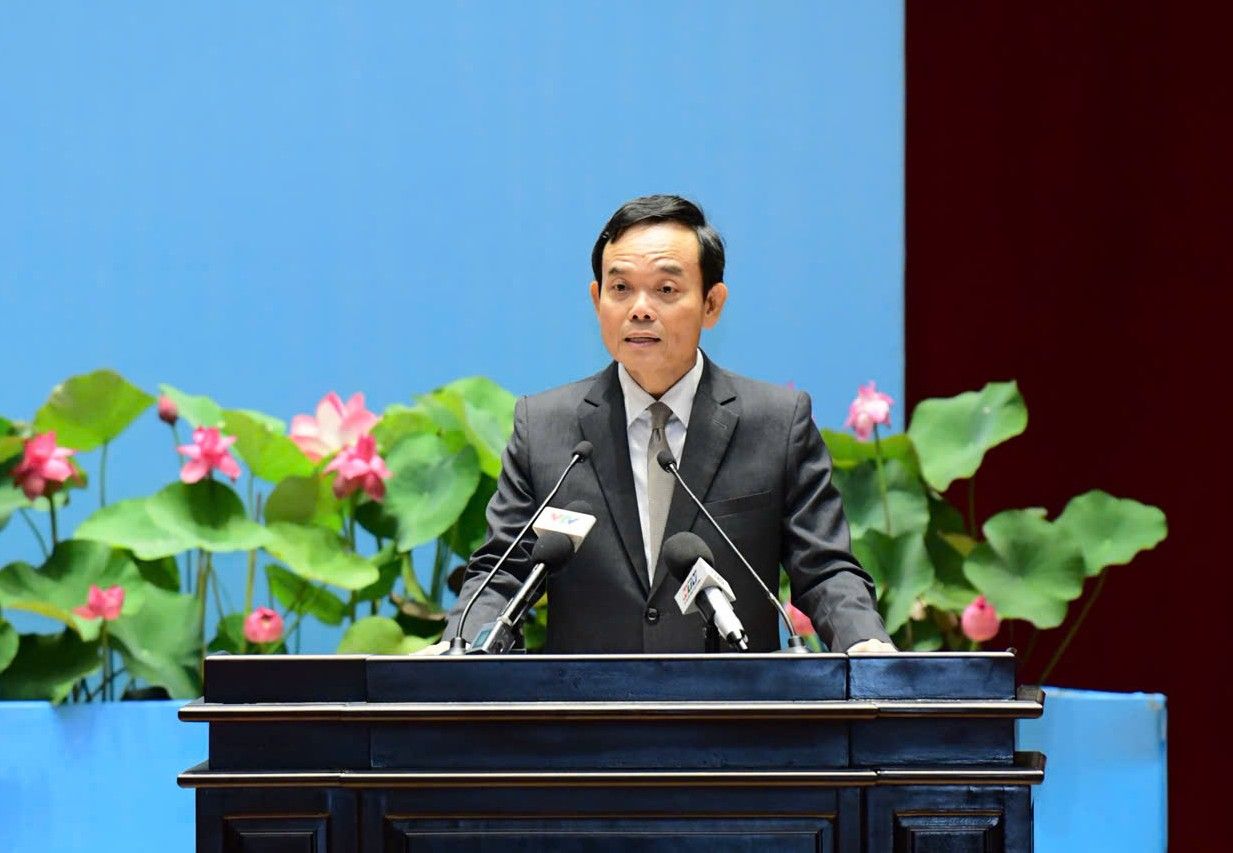 El Sr. Tran Luu Quang - Secretario del Comite Central del Partido Secretario del Comite del Partido de la Ciudad de Ho Chi Minh habla en el Congreso. Foto: Dinh Trong