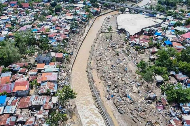 Mot khu vuc tinh Cebu (Philippines) bi tan pha do bao so 13 Kalmaegi. Anh: Xinhua