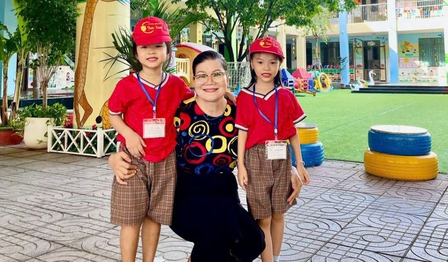 Gia dinh ba Giao co 4 the he deu lam nghe giao vien. Anh: NVCC