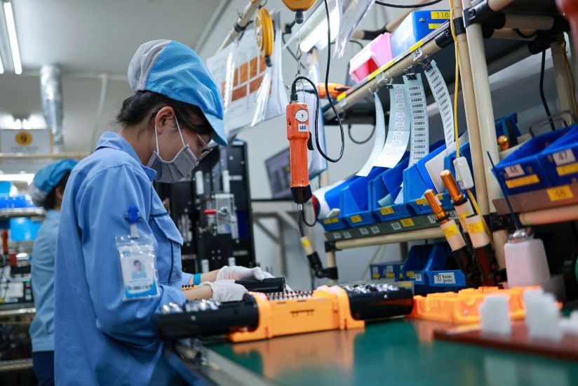 Trabajadores de Rhythm Vietnam Co. Ltd. (Hanoi) durante las horas de trabajo. Foto: Hai Nguyen