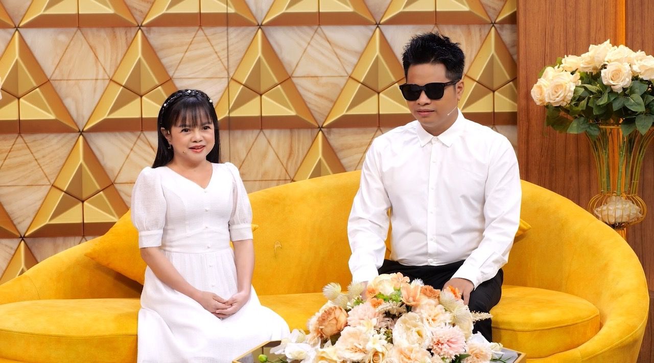 歌手タイン・ハンと夫。写真:ジェット提供.