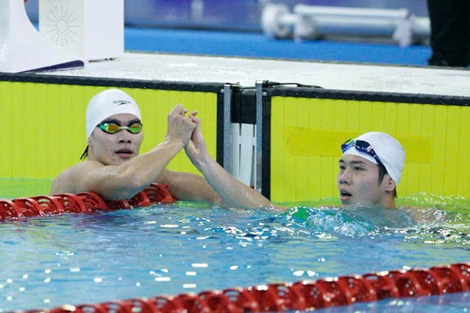 Kinh ngu Nguyen Quang Thuan (phai) lan dau gianh huy chuong vang o SEA Games. Anh: Minh Dan