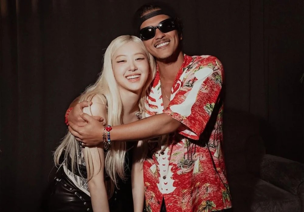 Bruno Mars (right) was criticized for being involved with BTS. Photo: Lotte