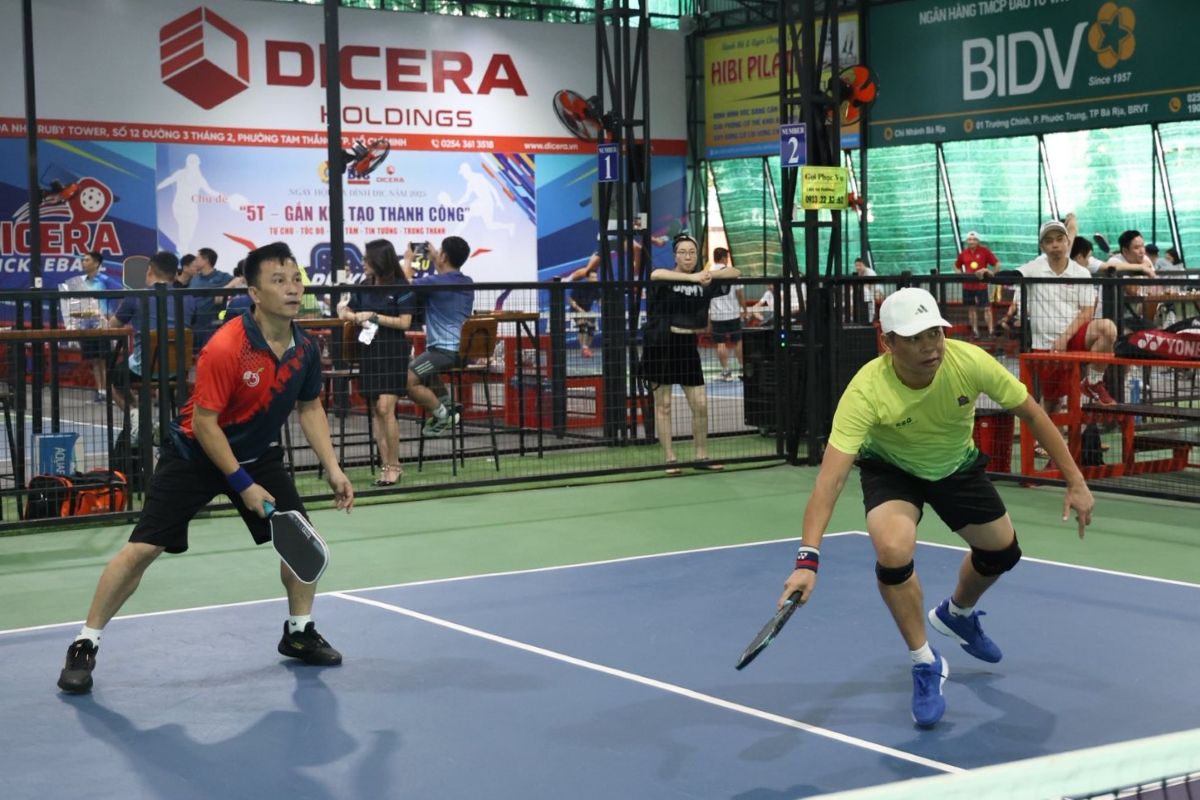Competing in pickleball in "DIC Family Day 2025". Photo: CDDIC