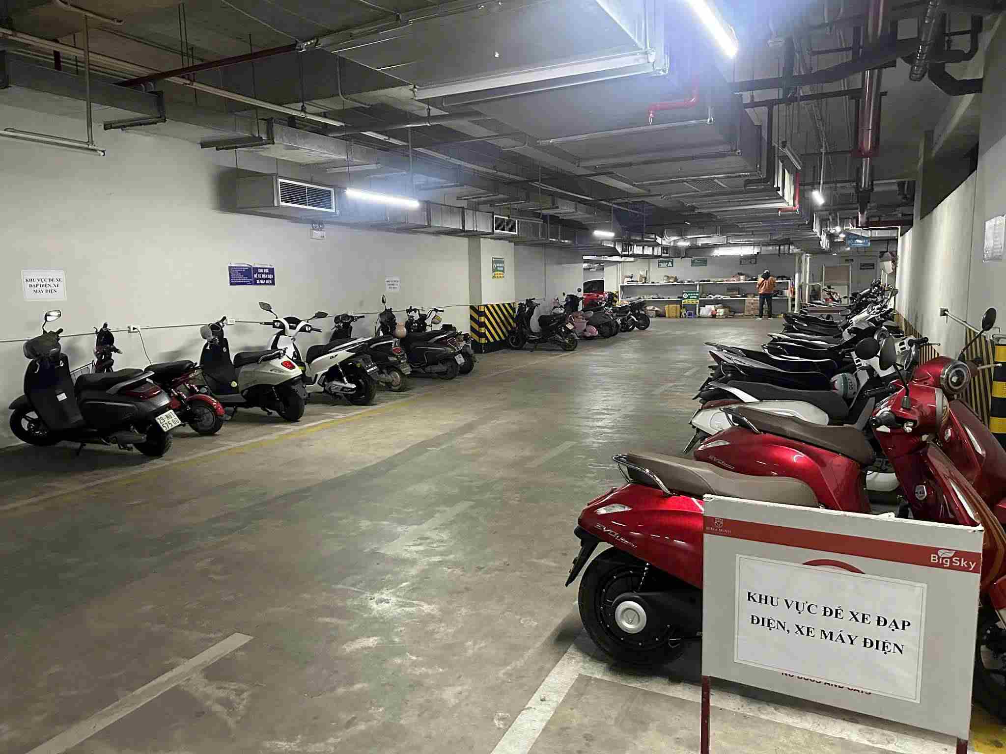 Most of the apartment buildings have separate areas for electric vehicles. Photo: Doan Vy