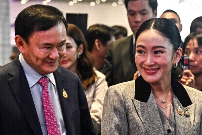 Ms. Paetongtarn Shinawatra (right) and Mr. Thaksin Shinawatra at an event in Bangkok, Thailand on July 9. Photo: AFP